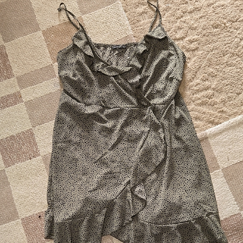 Green and black animal print ruffle dress